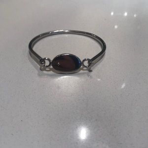 Silver bangle with diamond accent